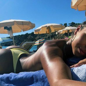 Natalia Garibotto nude sunbathing